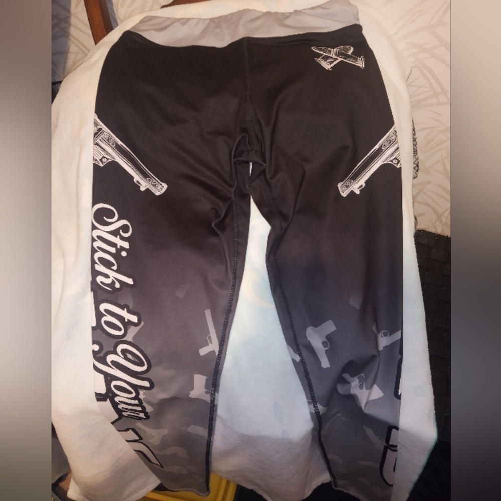 💥NWOT Xlusion Black And Grey Stick To Your Guns Graphic Print Leggings.